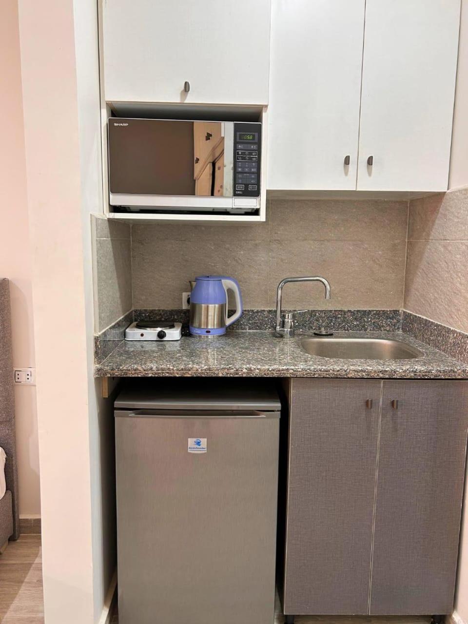 غرفه فندقيه بجوار الجامعه الامريكيه Apartment